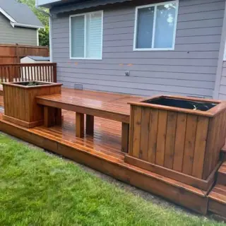 Freshly oiled cedar deck with built-in planters